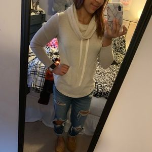 Adjustable cowl neck sweater with pocket